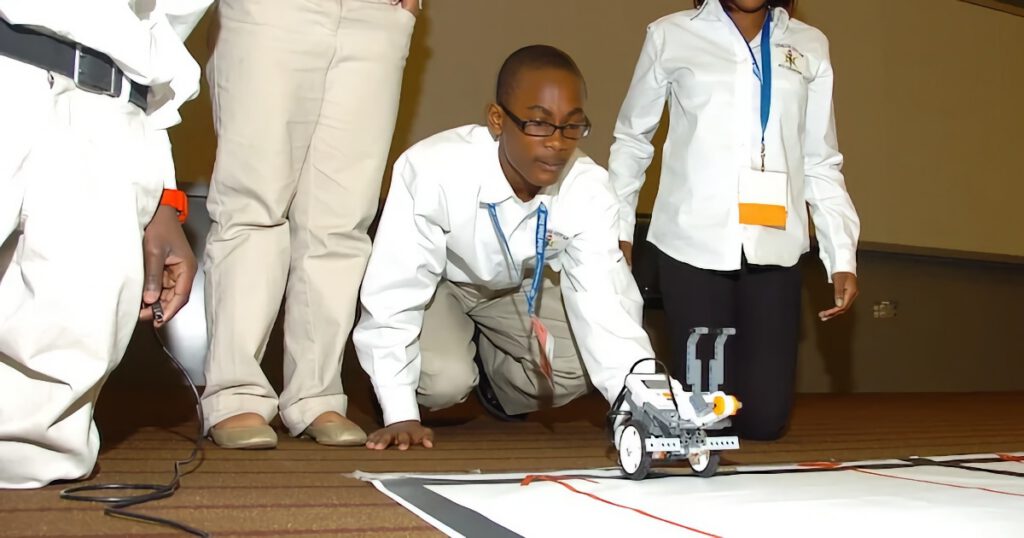 Young Black boys working on a STEM project.