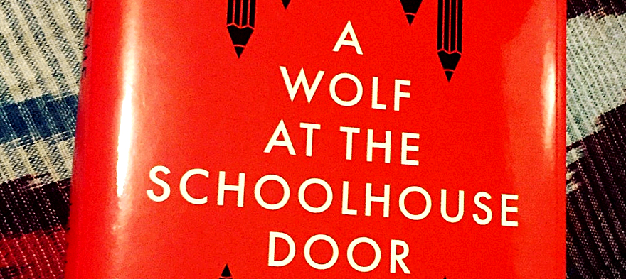 Schneider and Berkshire’s 'A Wolf at the Schoolhouse Door'  book cover