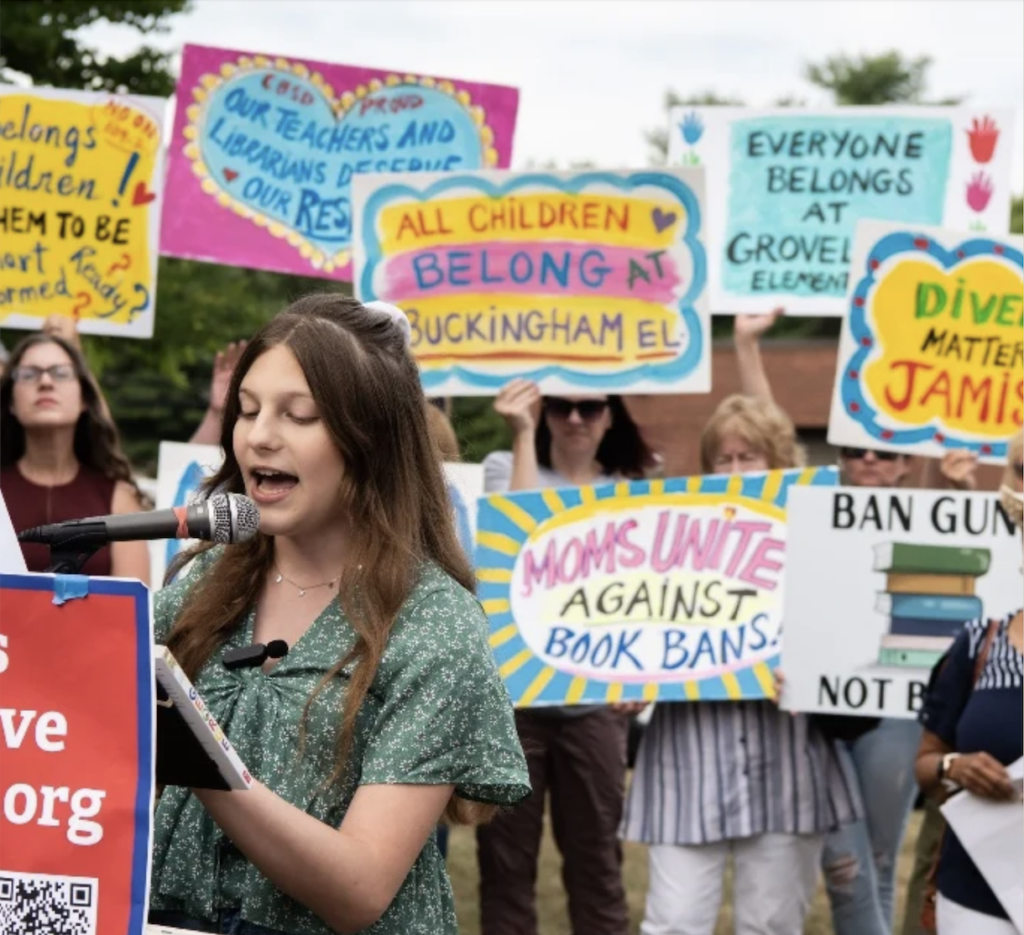 Woman speaking at a protest