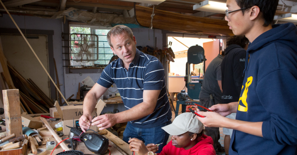 teacher instructing students