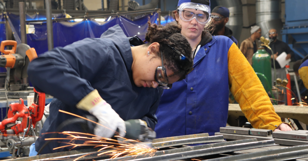 Student working in a vocational setting. Photo by PTTI EDU on Unsplash