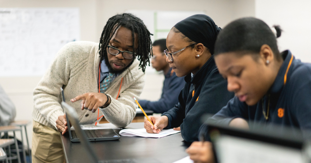 Teacher giving instruction to students. Photo courtesy Success Academy Charter Schools.