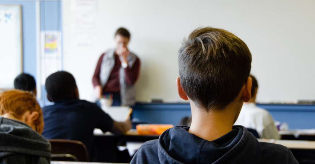 Students listening to their teacher.