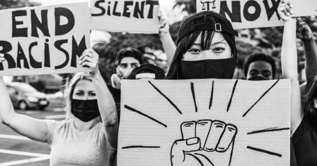 Group of young, diverse activists at a protest rally