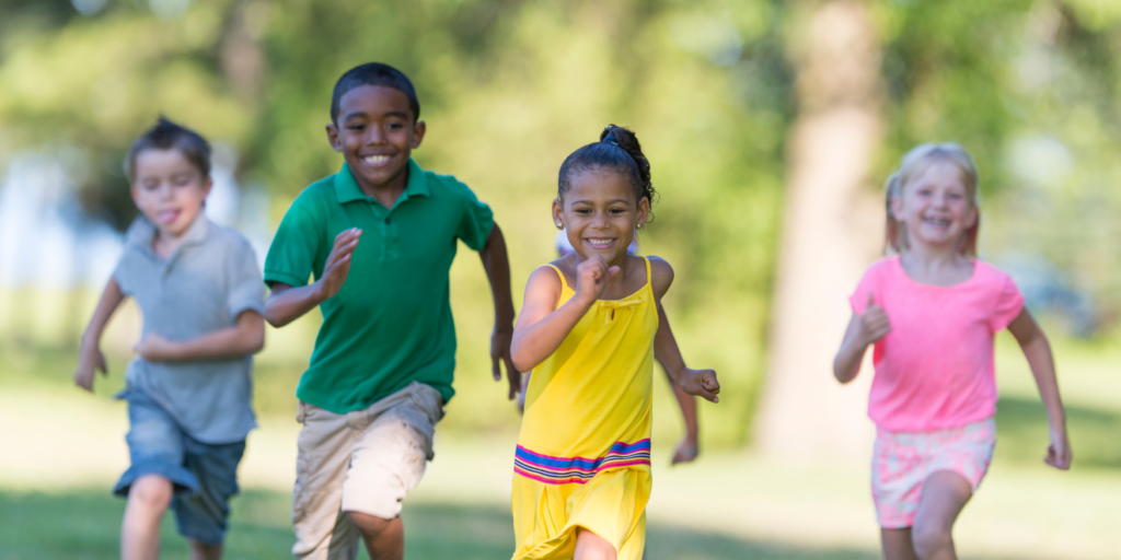 Happy children playing outside