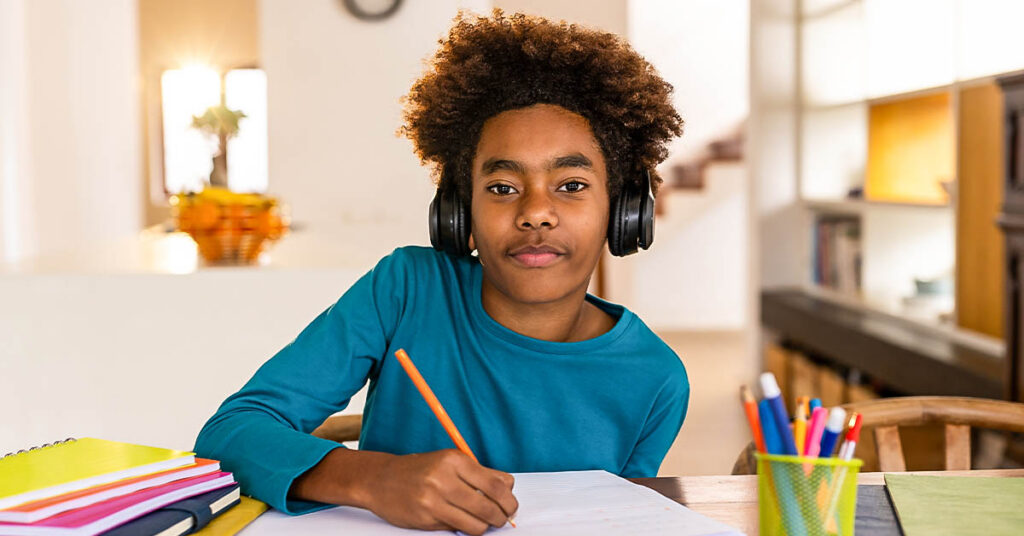 young african-american student doing schoolwork
