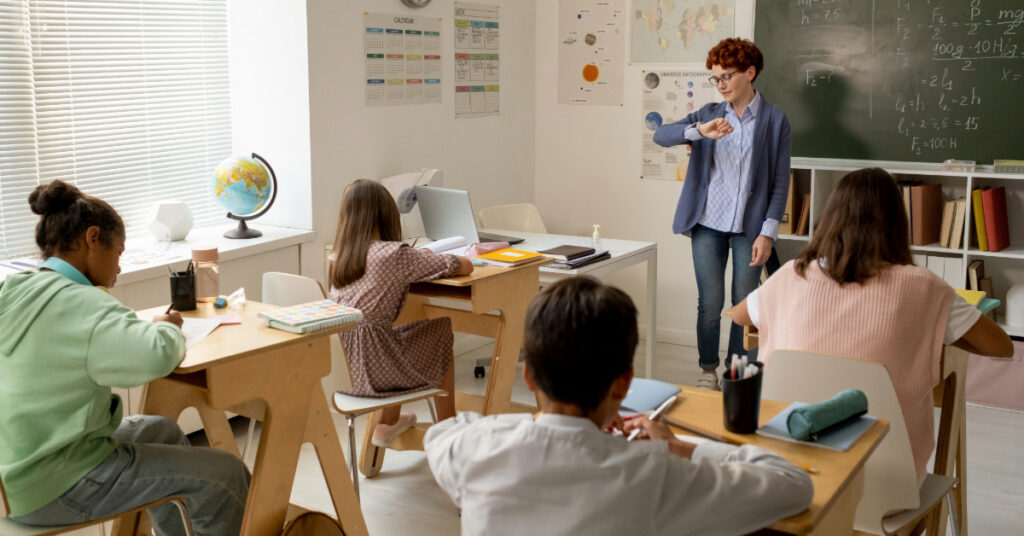 Teacher giving pupils some time for individual work