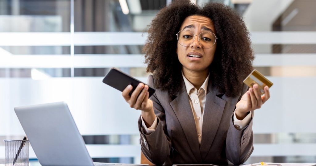 Financial problems with a bank account. Portrait of an upset and disappointed young Black business woman