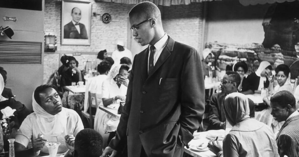 Malcolm X Teaching a room of students