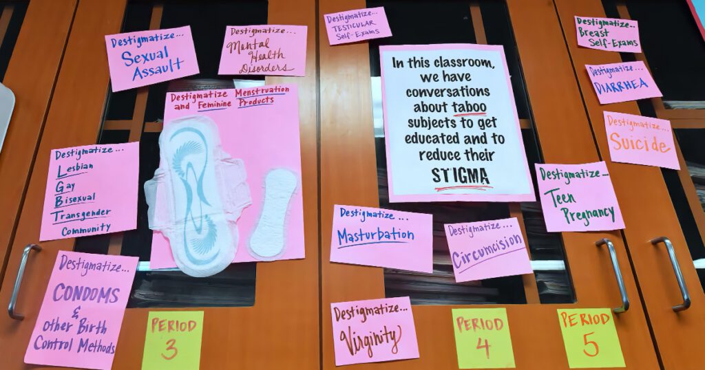 Posters are displayed in a Los Angeles Unified high school health education classroom in 2018. The Trump administration told 40 states to remove references to gender identity from a federally funded sex ed program and stripped California of its funding when it refused to do so. (Frederic J. Brown / AFP via Getty Images)